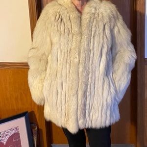 Women’s size medium vintage fox fur coat.